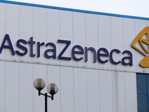 A sign over the entrance to an AstraZeneca plant