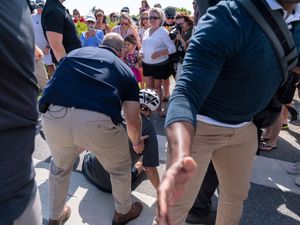 Supporting image for story: Joe Biden falls while getting off his bike after beach ride