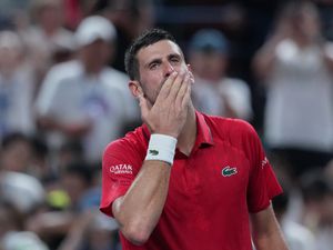 Supporting image for story: Novak Djokovic collapses in Shanghai heat but battles back to reach last eight