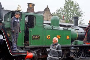 Station master Chris Thomas chats to fitter Steve Llewellyn