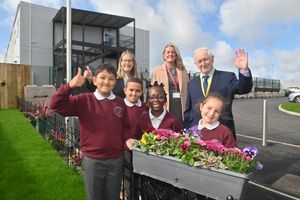 Pupils (left to right)cManpreet 8, Adam 9, Bonike 6 and Miley 6 with Fiona Seddon, Thomas Telford Multi Academy Trust, Headteacher Claire Whiting and Kevin Satchwell