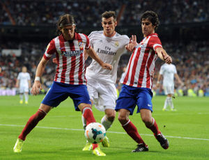 Filipe Luis playing against Real Madrid.