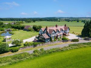 Supporting image for story: Stunning countryside home on the Shropshire/Staffordshire border with a pond and boat house hits the market