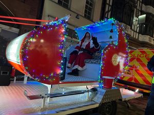 Santa on his sleigh at the lights switch-on.