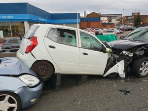 Supporting image for story: Driver arrested after police chase ends in three-car crash