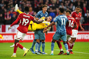 Nottingham Forest goalkeeper Odisseas Vlachodimos makes a save from pressure by Aston Villa players