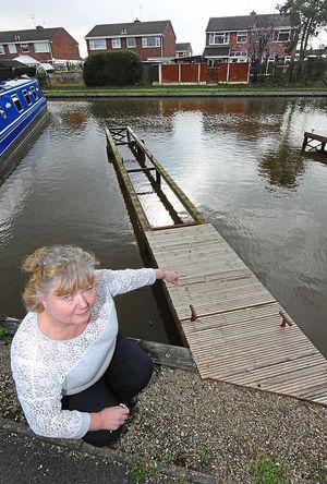 Julie Stephens is worried about the poor state of the jetty outside her house
