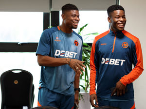 Emmanuel Agbadou (left) and Marshall Munetsi (Photo by Jack Thomas - WWFC/Wolves via Getty Images)