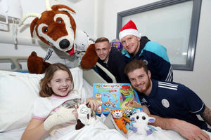 Keira Berry, 9, from Four Crosses, with AFC Telford's Bobby Buck, Kyle Brownhill, Mike Grogan and Ryan Higgins