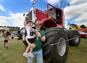 Hayden Williams and son Noah, aged two, meet Big Pete the monster truck.