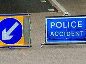 Supporting image for story: Four trapped after road crash