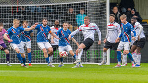 Ollie Harrison gets a shot at goal.