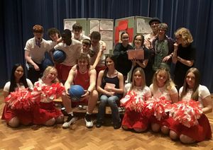 : Jacob Dixon and Nancy Minaker (centre seated) with other cast members in rehearsal for High School Musical