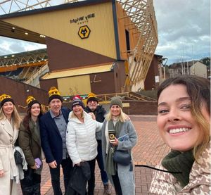 McLoughlin and his family on a visit to Molineux last season to celebrate his 60th birthday for Wolves' clash with Chelsea.