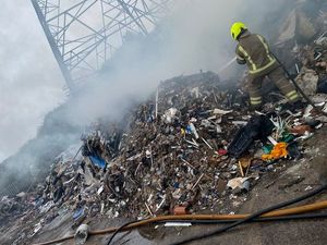 Supporting image for story: Firefighters tackle 20 tons of waste fire on Black Country wasteland