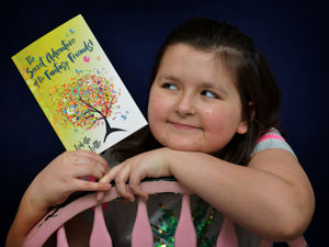 Supporting image for story: Ten-year-old Isabella pens book as she battles cancer 