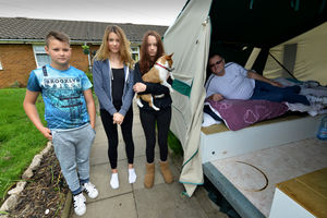 John admits it's not the ideal solution