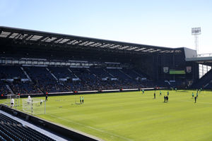 A wide view of players training on the pitch during an open training session at The Hawthorns (Photo by Adam Fradgley/West Bromwich Albion FC via Getty Images).
