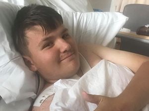 Kai Davis, 15, was in hospital for six days after allegedly being thrown to the floor and stamped on