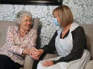 Supporting image for story: Enhanced visiting scheme allows families to help around 300 care home residents