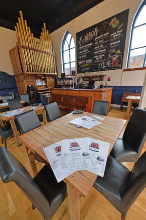 Holy Smoke Bar and Grill  