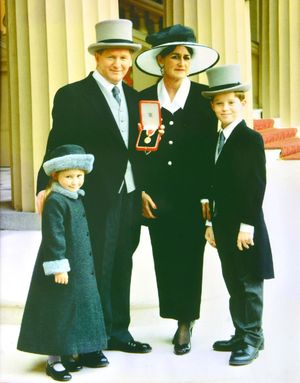 Sir Kevin Satchwell, wife Maria and children Joseph and Francesca during Sir Kevin's investiture at Buckingham Palace in 1991