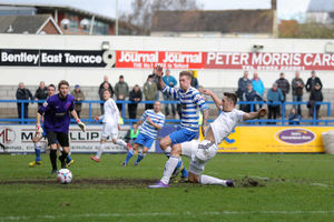 Andy Owens of AFC Telford United slides in to score a goal to make it 2-0 to Telford