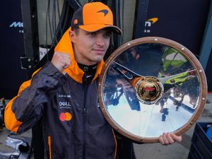 Lando Norris celebrates winning the first race of the season in Australia