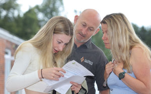 Ysgol Llanfyllin A Level results - Isobelle Palin opening her results with mum and dad. Photo: Phil Blagg Photography