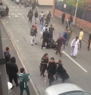 One man was left lying on the ground after being hit with a bat. Video: Khan Hussain/YouTube