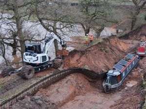 Supporting image for story: Incredible 'Transformer-like' digger provided by Shropshire firm helped rescue canal boats stranded in Whitchurch collapse