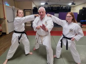 Supporting image for story: Sisters earn black belts 