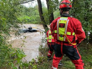 Supporting image for story: Lucky driver pulled to safety by Shropshire fire crews as car completely submerged in flood water