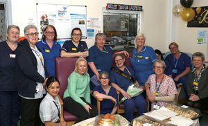 Jane Byrne surrounded by her colleagues at her retirement party