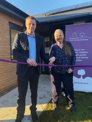 Robert Macey, Shropshire Councillor for Weston Rhyn and Maggie Rowlands, Chair of Weston Rhyn Parish Council, officially opening the Aspen Grange purpose built community room.