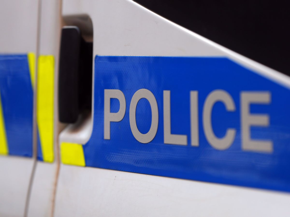 Two men arrested after customer stabbed to death in city centre bank