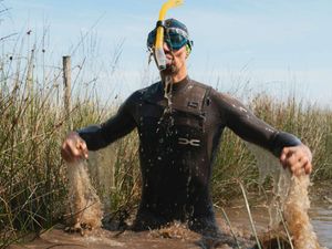 Supporting image for story: "It's a huge honour": Meet the first professional bog snorkeller after triumph in the mud of Mid Wales village