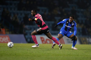 Dan Udoh of Shrewsbury Town and Daniel Phillips of Gillingham (AMA)