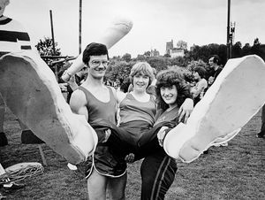 'Beware here comes Bigfoot! Wearing the big boots, Jill Arch receives a lift from fellow team members Gordon and Teresa Hogg. The threesome were members of the Bridgnorth team that took part in the It's A Knockout competition at Bridgnorth Carnival yesterday.' The picture was taken on May 25, 1980.