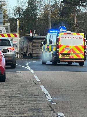 Van on its side at Emstrey Island, Shrewsbury