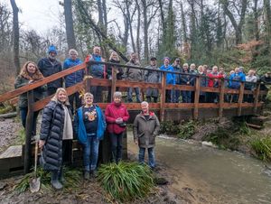The picture shows the bridge being tested by SGCT volunteers following a ribbon cutting ceremony by trustee and local councillor Carolyn Healy.  