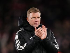 Newcastle head coach Eddie Howe applauds the fans after a Premier League defeat at Brentford