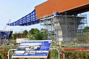 The slide will see the brown platform structure shifted to the next podium by using Teflon non-stick pads