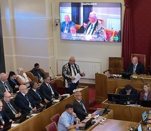 Cllr Patrick Harley on his feet during a full council meeting in April wearing a jacket he won in an auction at the mayor\'s ball. Picture Martyn Smith/LDRS free for LDRS use