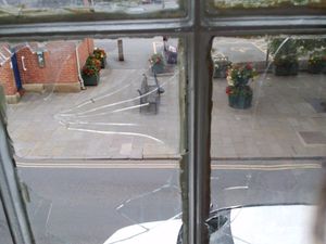 Supporting image for story: Toddlers covered in glass after window smashed above Ellesmere kebab shop