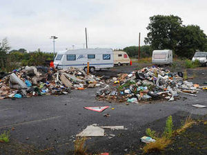 Supporting image for story: Travellers in city at home with rubbish