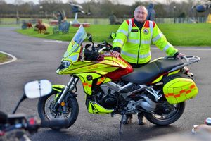 Volunteer blood bike rider Hugh Jackson, from Wrexham, with the bike named Chloe Lou