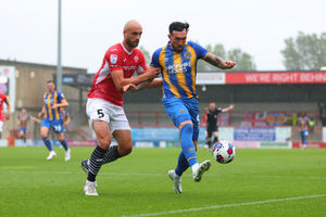 Ryan Bowman of Shrewsbury Town and Farrend Rawson of Morecambe (AMA)