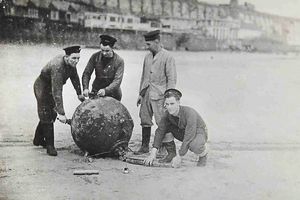 This photograph shows defences and a bomb pulled out of the sea

