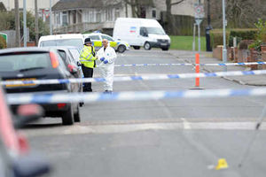 Police at the scene of a shooting on Showell Road, Bushbury, at the junction of Fifth Avenue, in 2012
